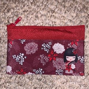 Free with purchase small makeup bag